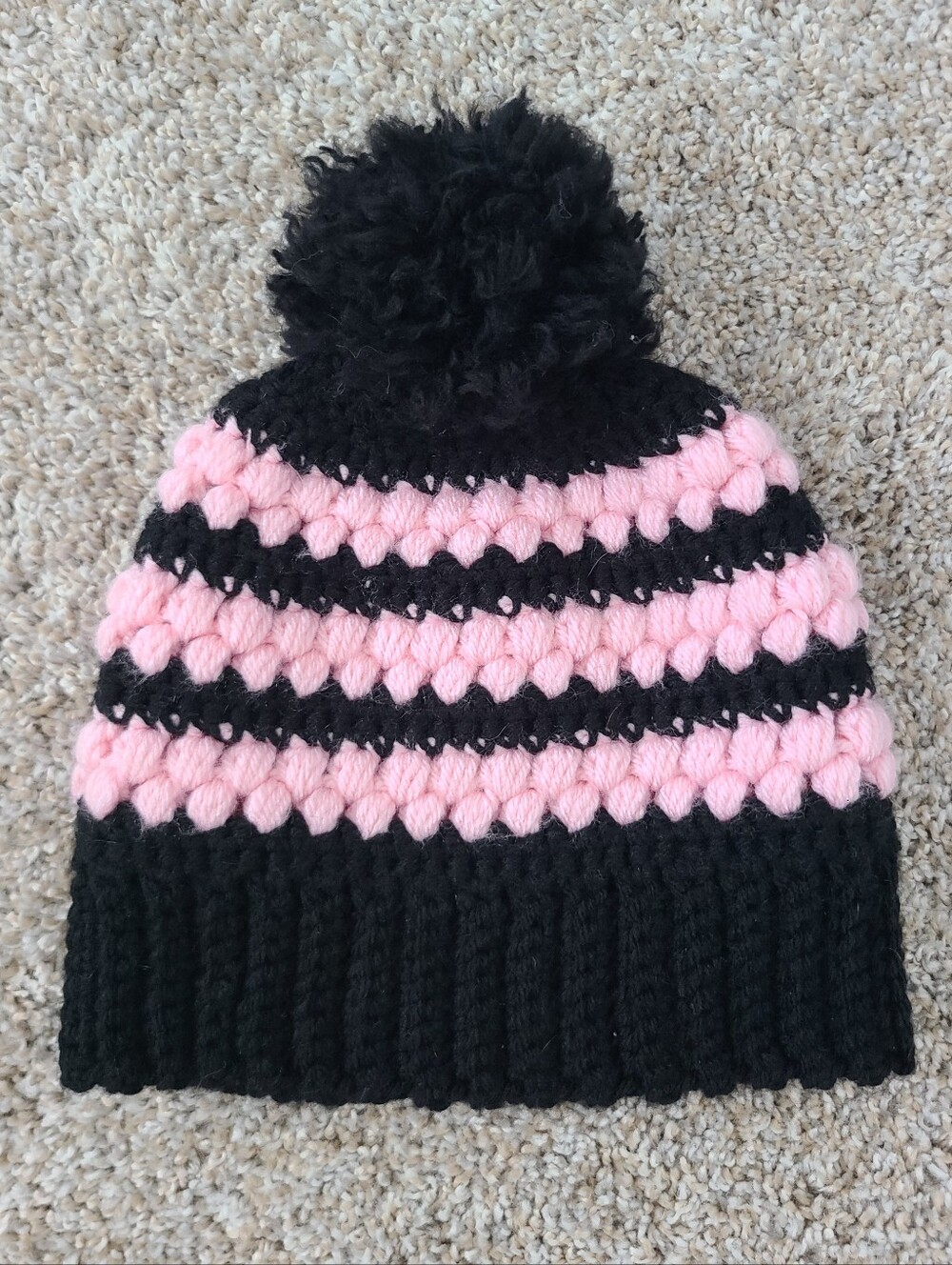 Womens Black and Pink Pom Pom Beanie Hat